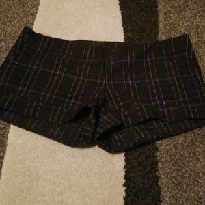 Black plaid dress type shorts.